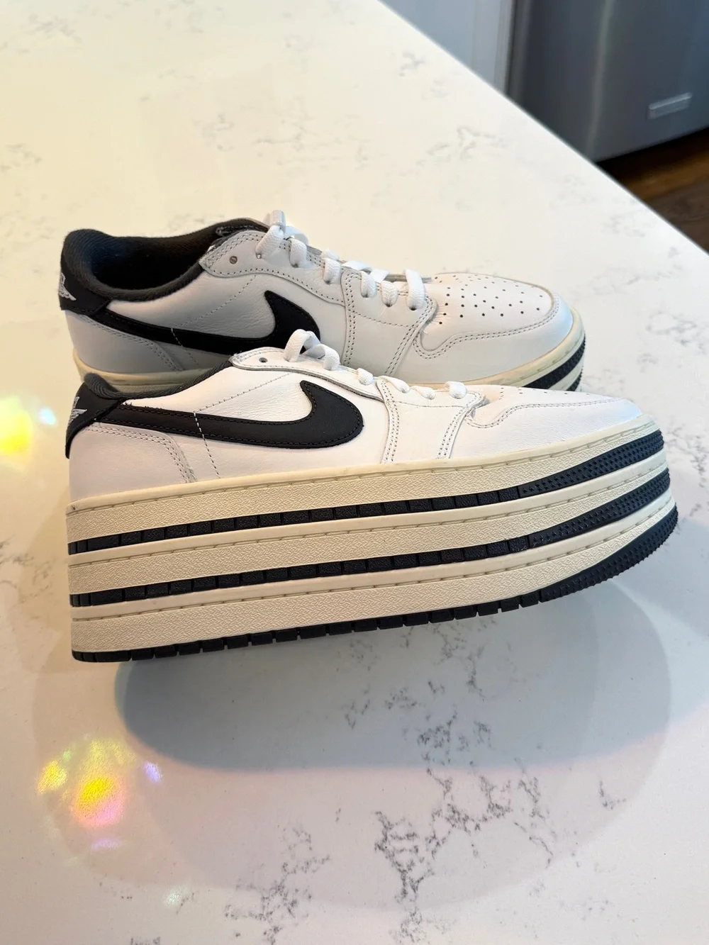 nike women’s air jordan 1 triple stack platform sneakers 9